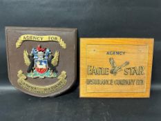 Two insurance plaques: Eagle Star, 17 x 14
