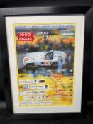 A mounted, framed and glazed poster for the 2004 1000 Miglia, 20 x 26