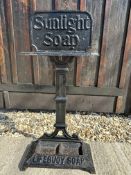 A Sunlight Soap and Lifebuoy Soap umbrella stick stand, 29