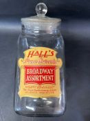 A glass counter top sweetie jar labelled Hall's Broadway Assortment, 13