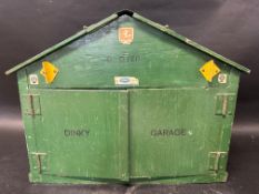 A wooden toy garage, light bulbs included, 16 1/2