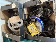 A quantity of mixed electrical spares, magnetos, a flywheel etc. (two boxes).