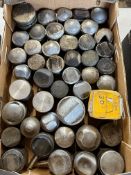A box of mixed pistons.