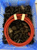 A box of spark plugs, caps and a coil 