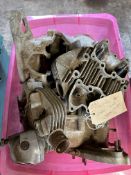 A box of Triumph heads and crank cases.