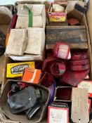 A box of lights, lamp lenses, switches etc. appear new old stock including Lucas, Osram, PMG etc.