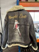 Three gentleman's coats: a heavy sheepskin flying jacket with Memphis Belle graphics to the back,