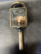A 1920s-30s candle lamp.