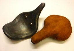 Velocipede reproduction saddle together with an Ordinary saddle pan and an old leather saddle top (