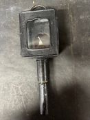 A 1920s-30s candle lamp.
