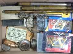 A box of cycling ephemera inc. Tour de France models, expanding cups, tobacco flask, boxed set of