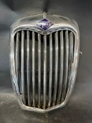 A Riley 1.5 radiator surround (some damage to enamel), 18