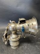 A Miller No.1 nickel plated Betolite lamp with lighthouse sides (L&R).