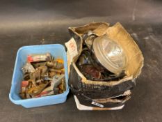 A Wipac spot light and five rear lights in need of refurbishment along with a box of misc items