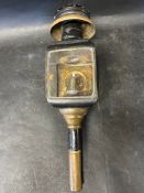A 1925/30 candle lamp.