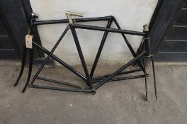 Two black bicycle frames.