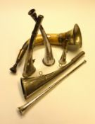A Parkers bicycle bugle and five other types to include an assayed silver post-horn style example (