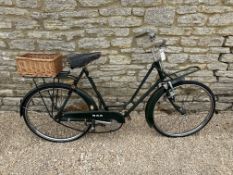A circa 1950 BSA lady's bicycle in good condition, with front and rear racks.