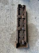 A vintage AC 6 cylinder head.