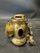 A Jos. Lucas Model Club brass paraffin lamp.
