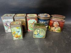 Seven Mazawattee Tea canisters.