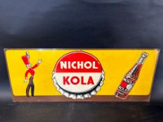 A circa 1940 Nichol Kola American tin litho advertising sign depicting a band leader presenting a