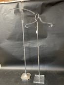 Two clothes stands, adjustable heights.