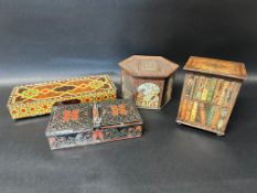 Four biscuit tins including a Huntley & Palmers bookshelf, a hexagonal Meredith & Drew Ltd. tin with