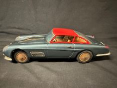 A Bandai Ferrari Super America friction-powered model car, 11 x 4