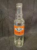 A Vigzol Motor Oil glass pint-sized oil bottle.
