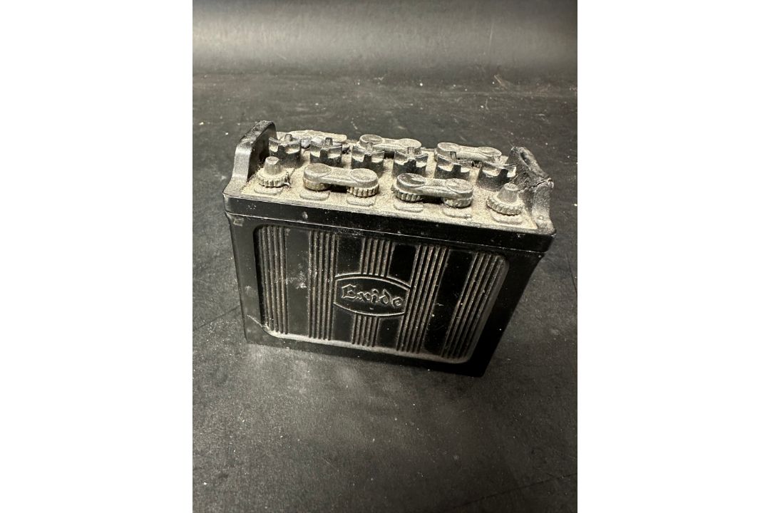 An Exide Batteries novelty ashtray with hinged lid and matchstriker to base, damage to one side - Image 1 of 6