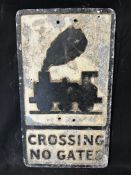 A reproduction 'Crossing No Gates' cast aluminium road sign, 12 x 21