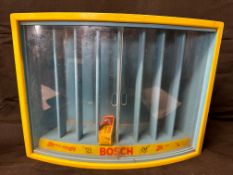 A Bosch wall-hanging/counter top spark plug display cabinet, 14 x 10 x 5