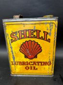 A Shell Lubricating Oil gallon can stamped number 24413 to one side.