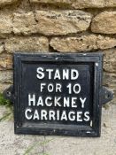 A 'Stand for 10 Hackney Carriages' cast iron road sign with original fixing holes on either side, 15