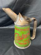 A Wakefield Castrol Motor Oil quart measure.