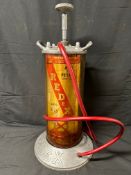 A Redex forecourt upper cylinder lubricant oil dispenser.