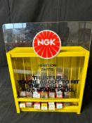 An NGK Spark Plugs garage dispensing wall hanging/counter top display cabinet. Trust us. You're