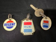Three celluloid Regent Petrol key fobs, each double sided, one also advertising Havoline Motor