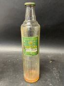 A BP Energol quart motor oil glass bottle with viscostatic label.