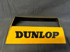 A Dunlop foldable tyre stand.
