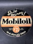 A Mobiloil 'in a sealed drum' price indicator per quart circular tin advertising sign, 10 1/4