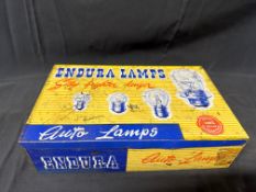 An Endura Lamps auto lamps tin with n.o.s. contents.
