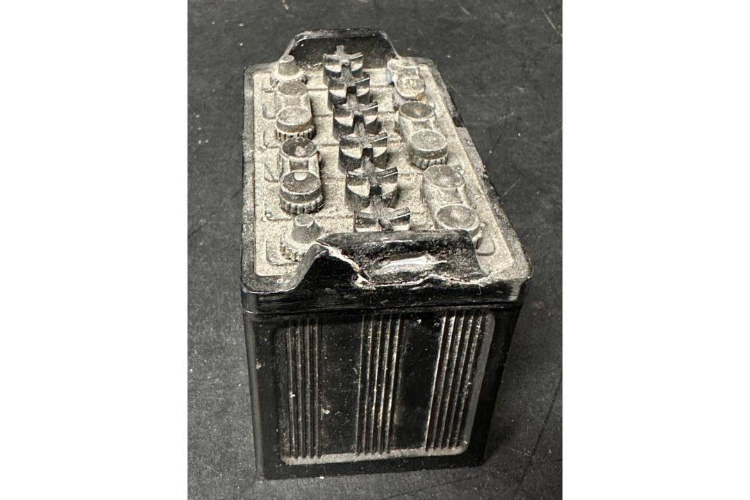 An Exide Batteries novelty ashtray with hinged lid and matchstriker to base, damage to one side - Image 6 of 6
