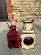 Two road/railway lamps.