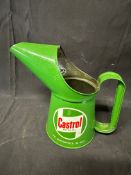 A Castrol 1988 pint oil measure.