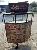 A Holt's steel garage display cabinet with door to rear for storage and a glazed section above