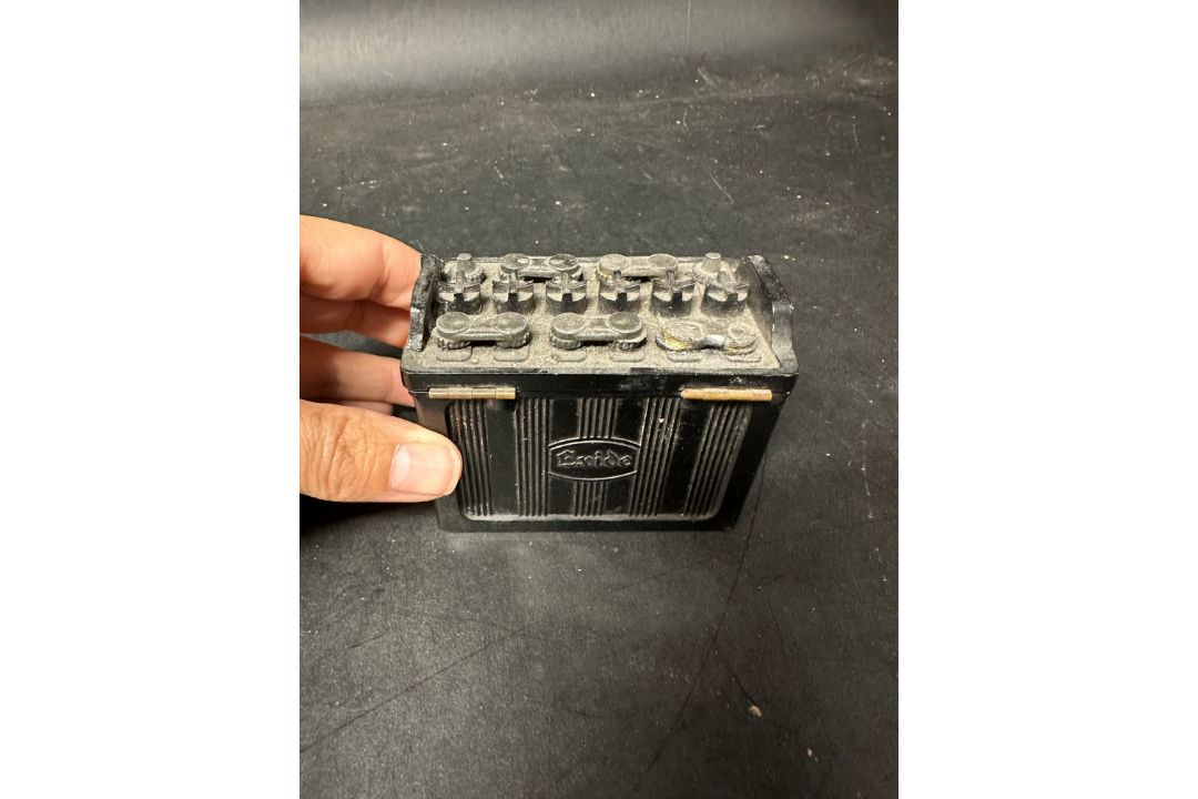 An Exide Batteries novelty ashtray with hinged lid and matchstriker to base, damage to one side - Image 3 of 6