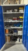 Blue/grey metal storage cabinet with contents