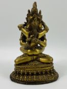 Brass figure of a couple with copper base